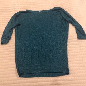 Quarter length sleeve blouse. Teal/Blue color.